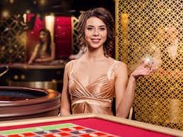 niastoto login live blackjack dealer studio with multi-camera setup during Olympic Games broadcast period